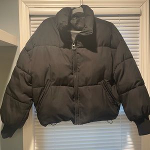 women’s black puffer jacket